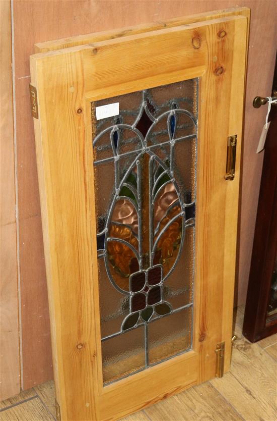 A pair of leaded light pine doors